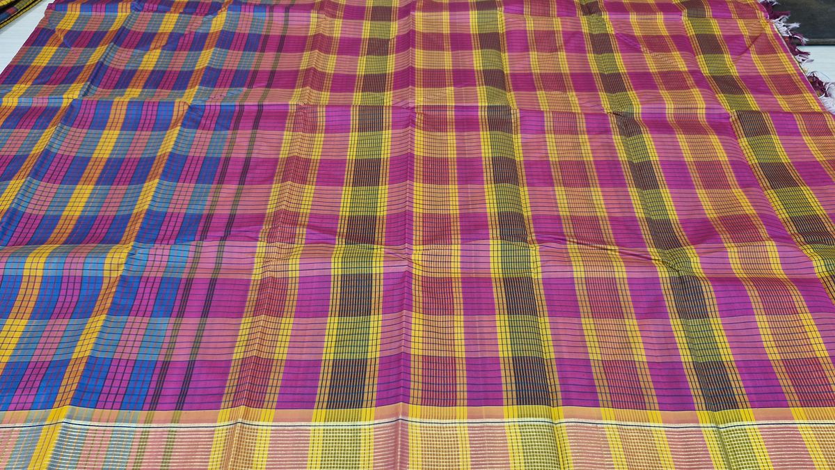 A colourful checked silk saree spread out